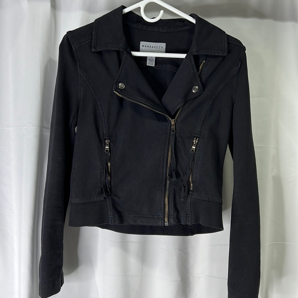 Love this jacket!! Great condition!  Stretchy comfortable material!